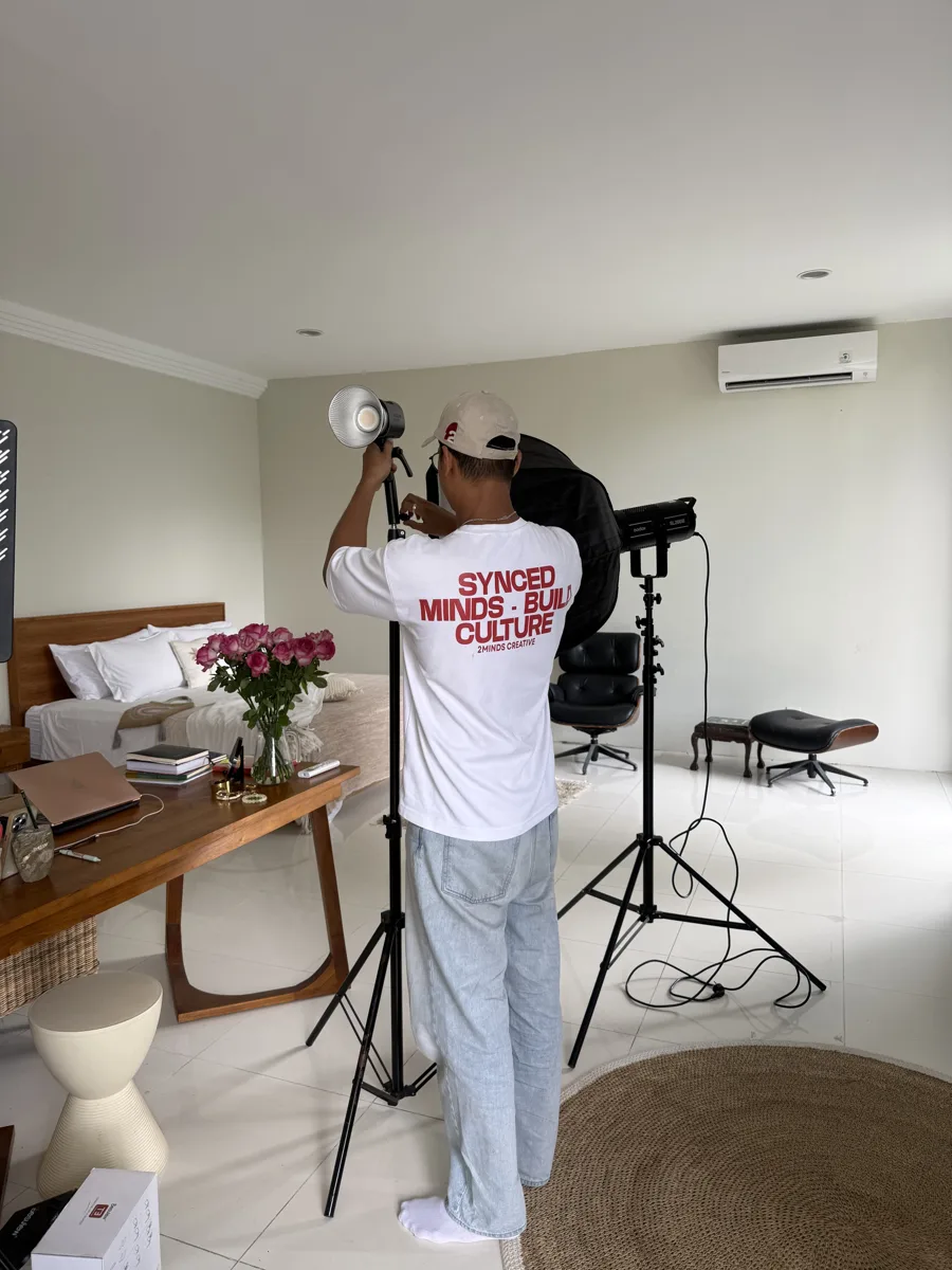 Adjusting studio lighting before a session