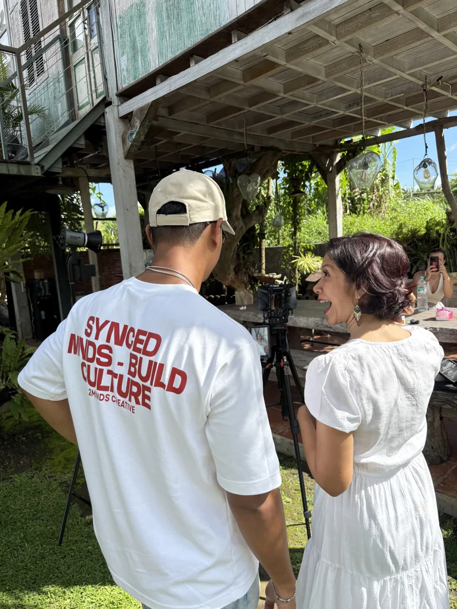 Our team with a client on set
